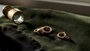 Close-up of gold lobster and spring ring clasps