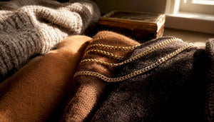 Gold chains on fabric showing seasonal texture change