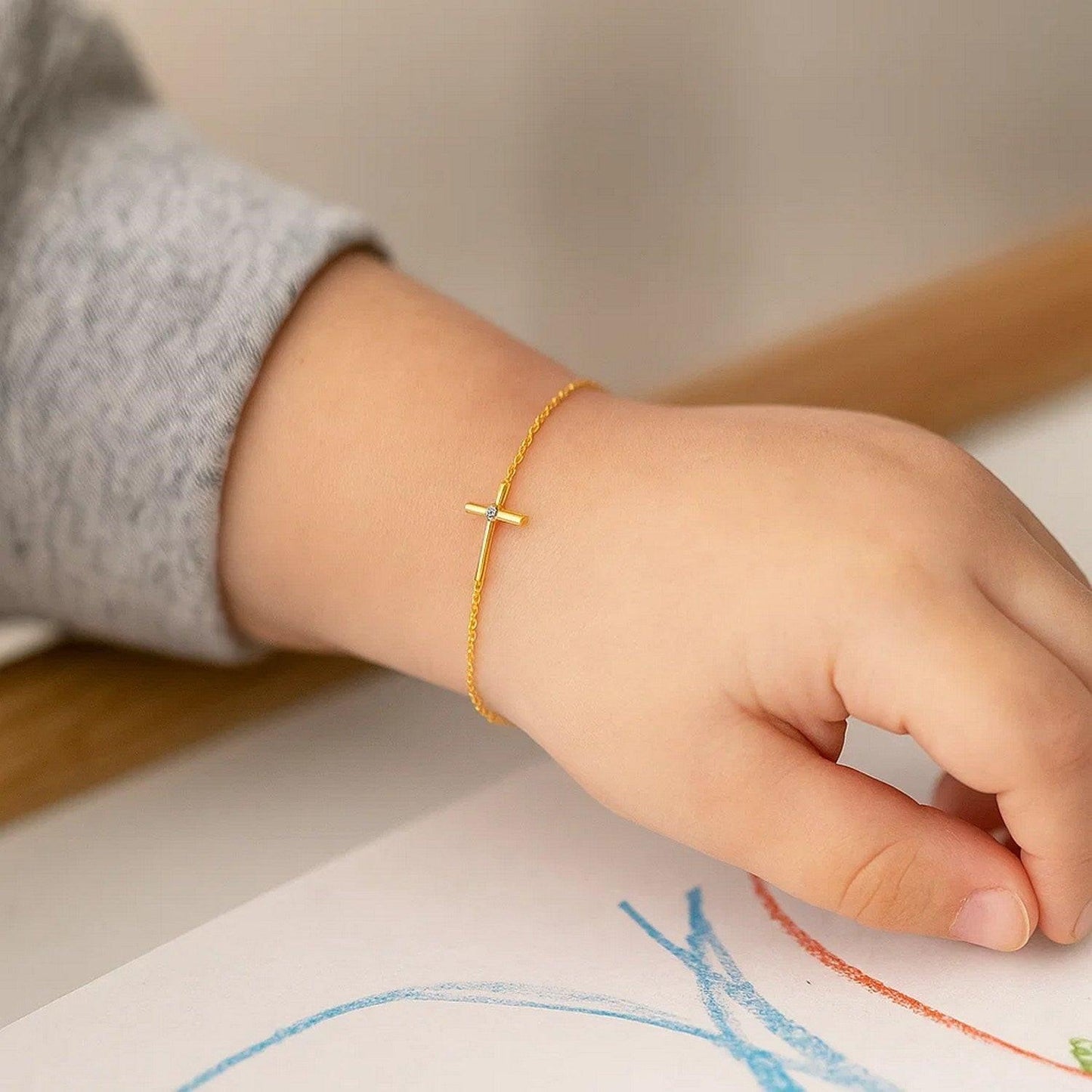 14k Yellow Gold 5 1/2 inch Childrens Bracelet with Cross (1.00 mm)