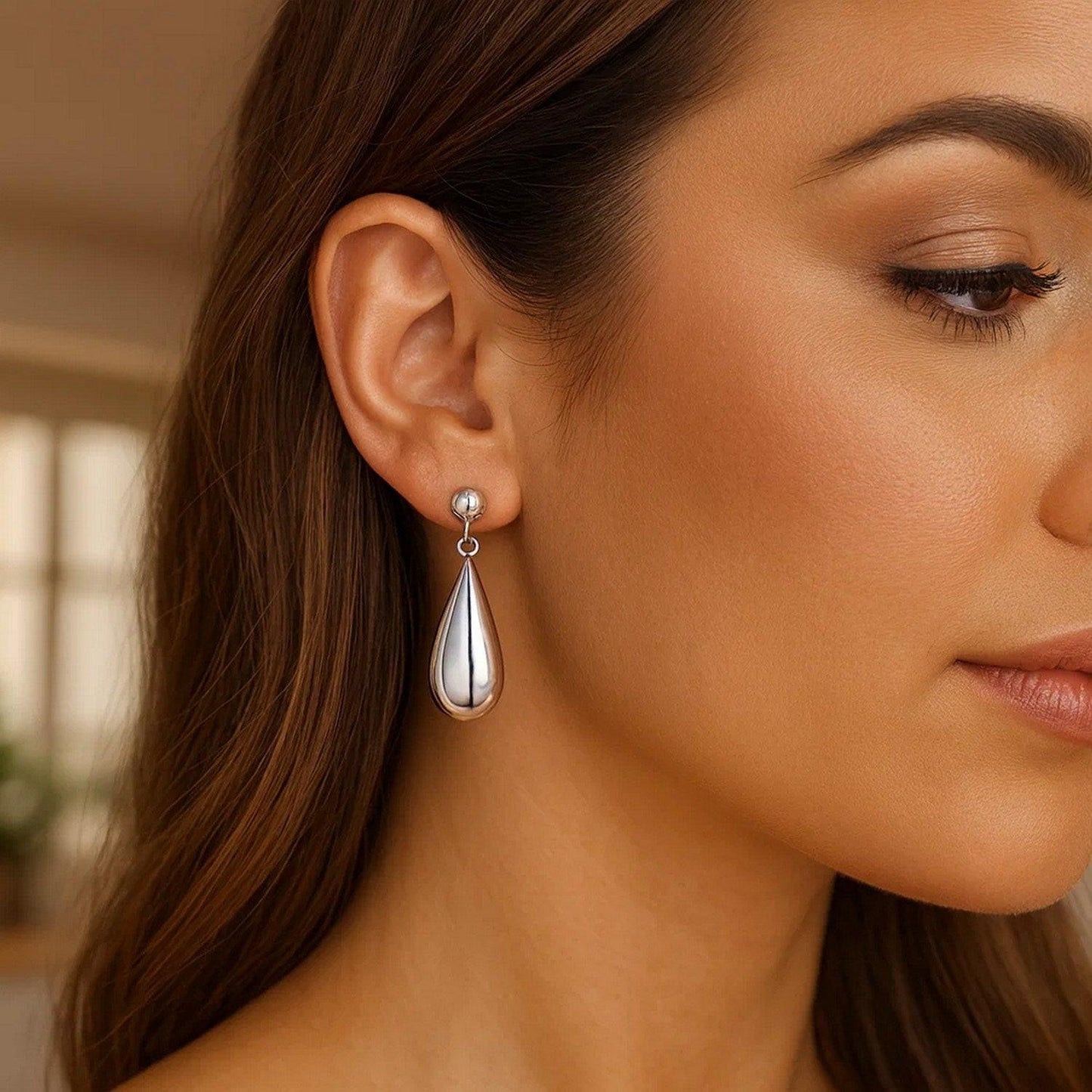 Sterling Silver Rhodium Plated Puffed Teardrop Dangle Earrings