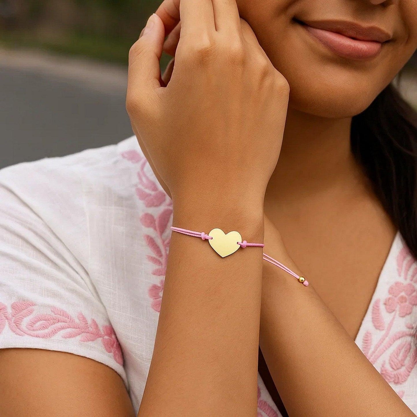 9 1/4 inch Pink Cord Adjustable Bracelet with 14k yellow Gold Heart